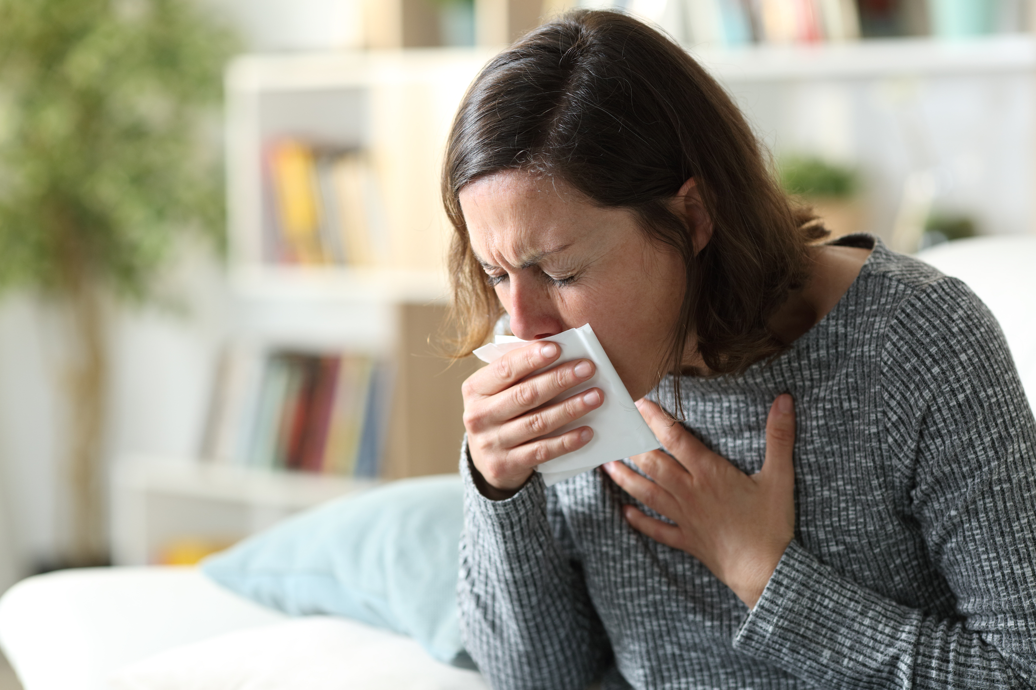 Woman coughin